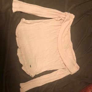 A pink off shoulder top